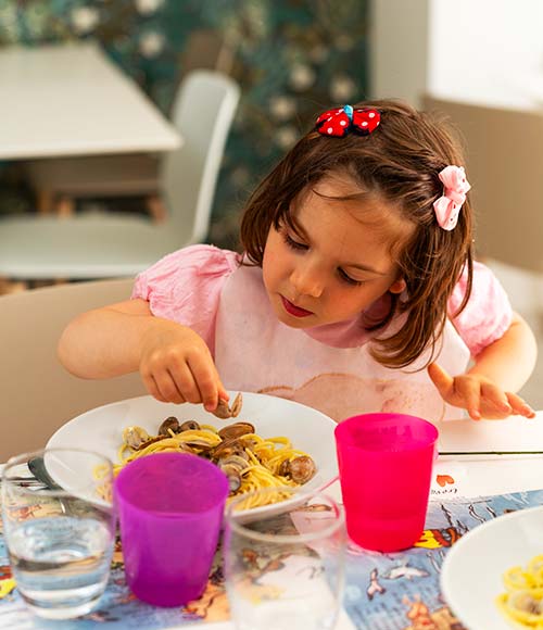 Little girl at the table