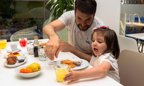 Little girl at breakfast